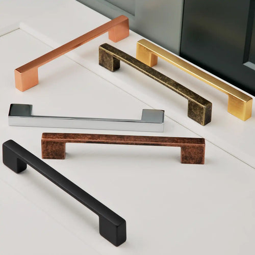 Collection of modern cabinet handles in different metallic finishes.