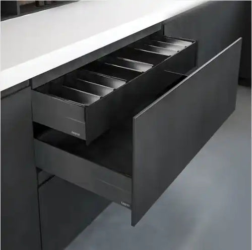 Dark gray drawer with built-in utensil organizer compartments.