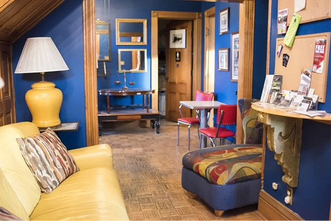 Living room with a yellow couch